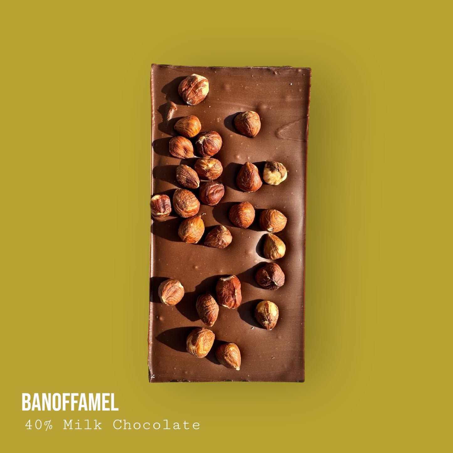 Banoffamel – Milk Chocolate with Banana Caramel Banoffee, Hazelnuts & Dark Chocolate Lime Drizzle 255g