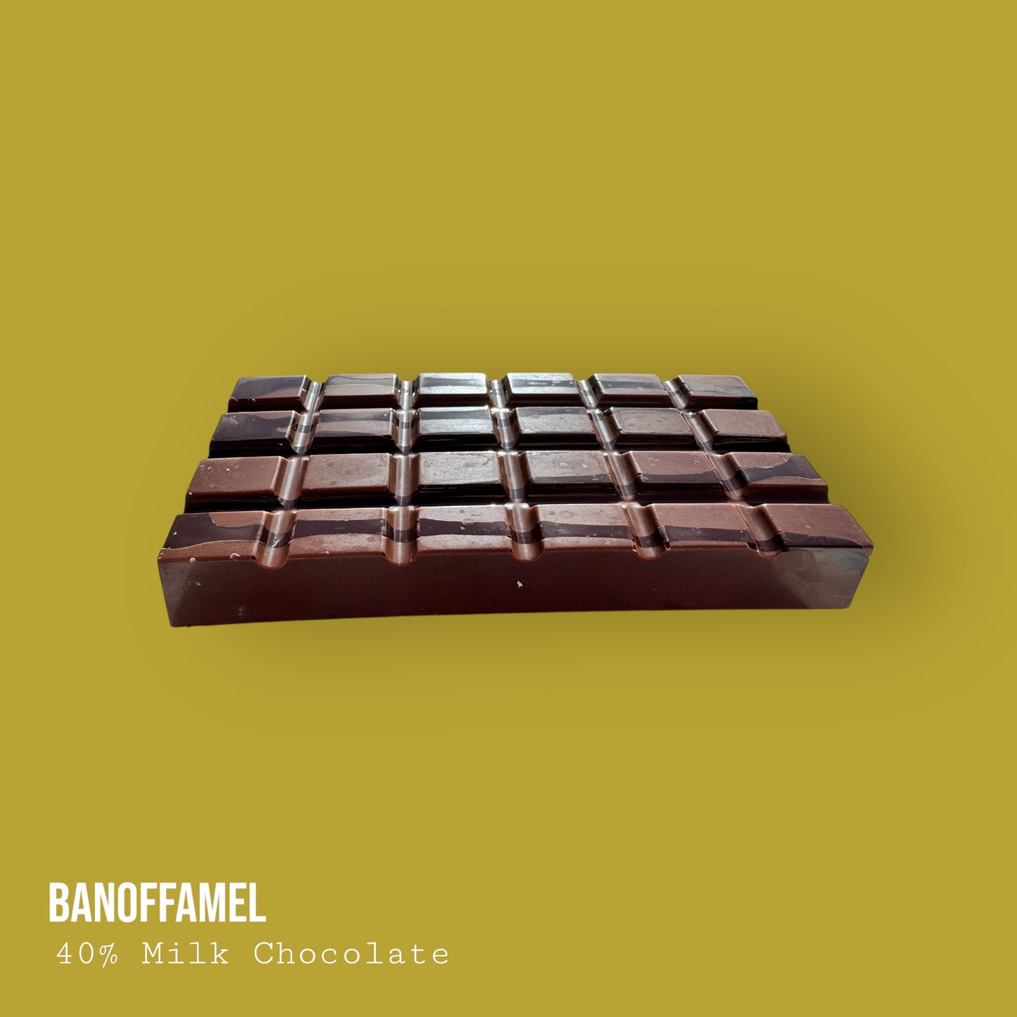 Banoffamel – Milk Chocolate with Banana Caramel Banoffee, Hazelnuts & Dark Chocolate Lime Drizzle 255g