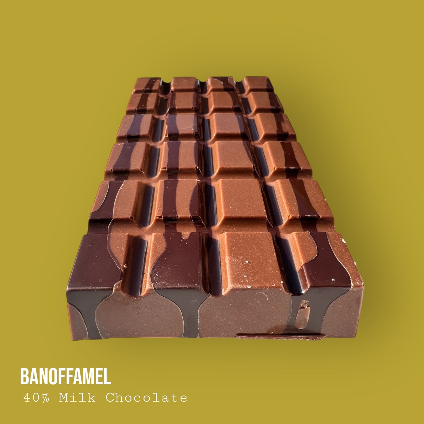 Banoffamel – Milk Chocolate with Banana Caramel Banoffee, Hazelnuts & Dark Chocolate Lime Drizzle 255g