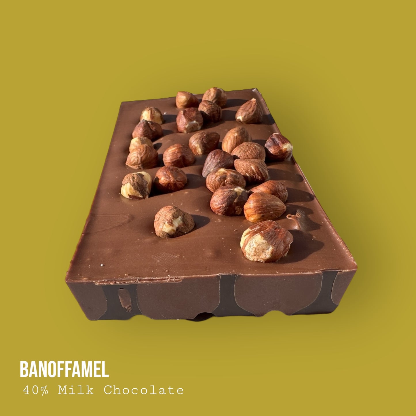 Banoffamel – Milk Chocolate with Banana Caramel Banoffee, Hazelnuts & Dark Chocolate Lime Drizzle 255g